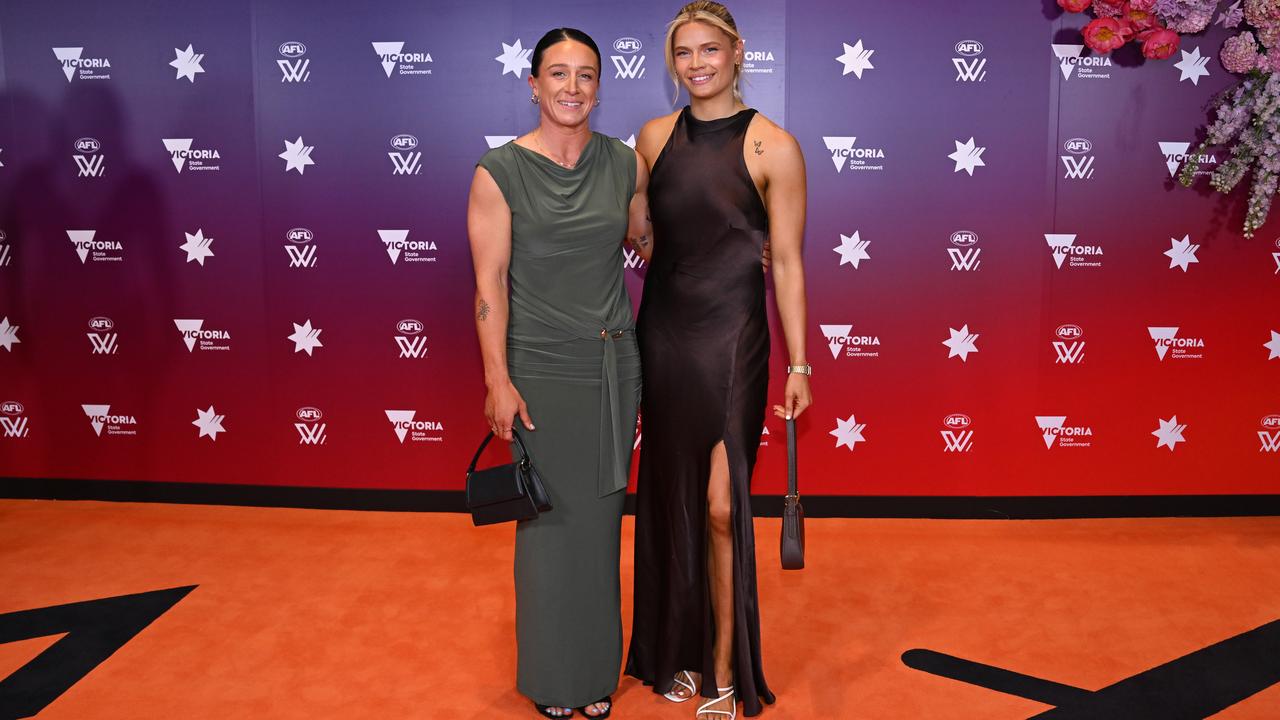 Georgie Prespakis (R), seen with fellow Cat Julia Crockett-Grills.