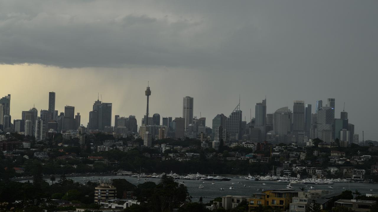 A thunderstorm is seen passing over Sydney city