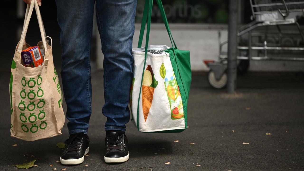 A shopping bag with Woolworths signage