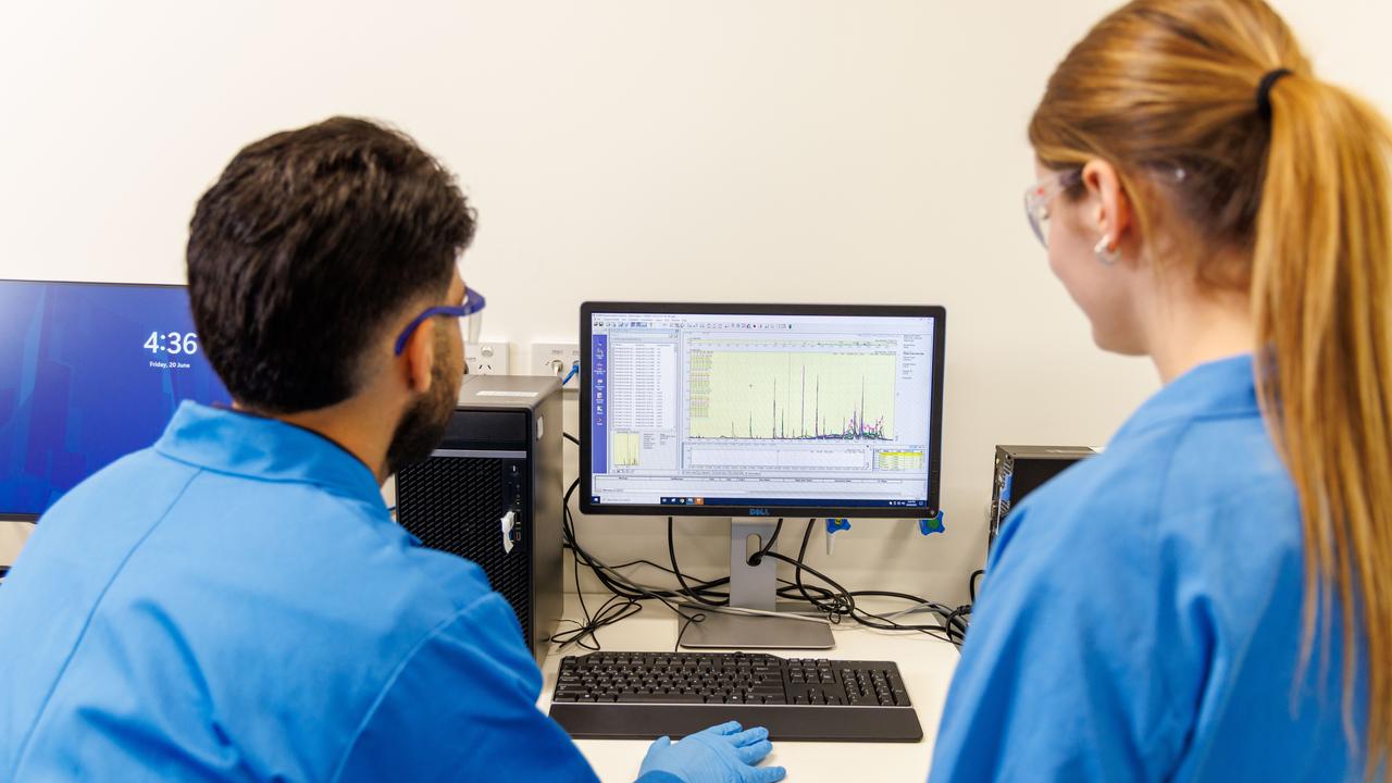 Researchers looking at results