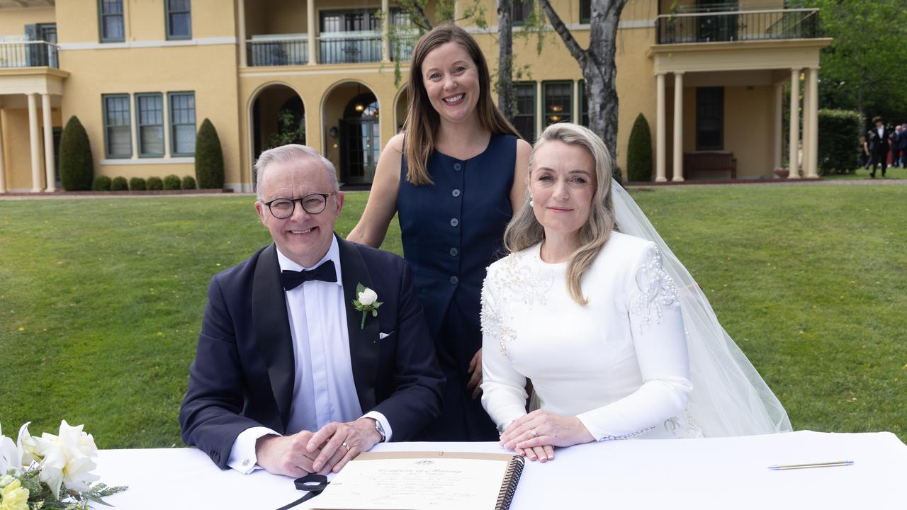 Anthony Albanese and Jodie Haydon sign wedding certificate