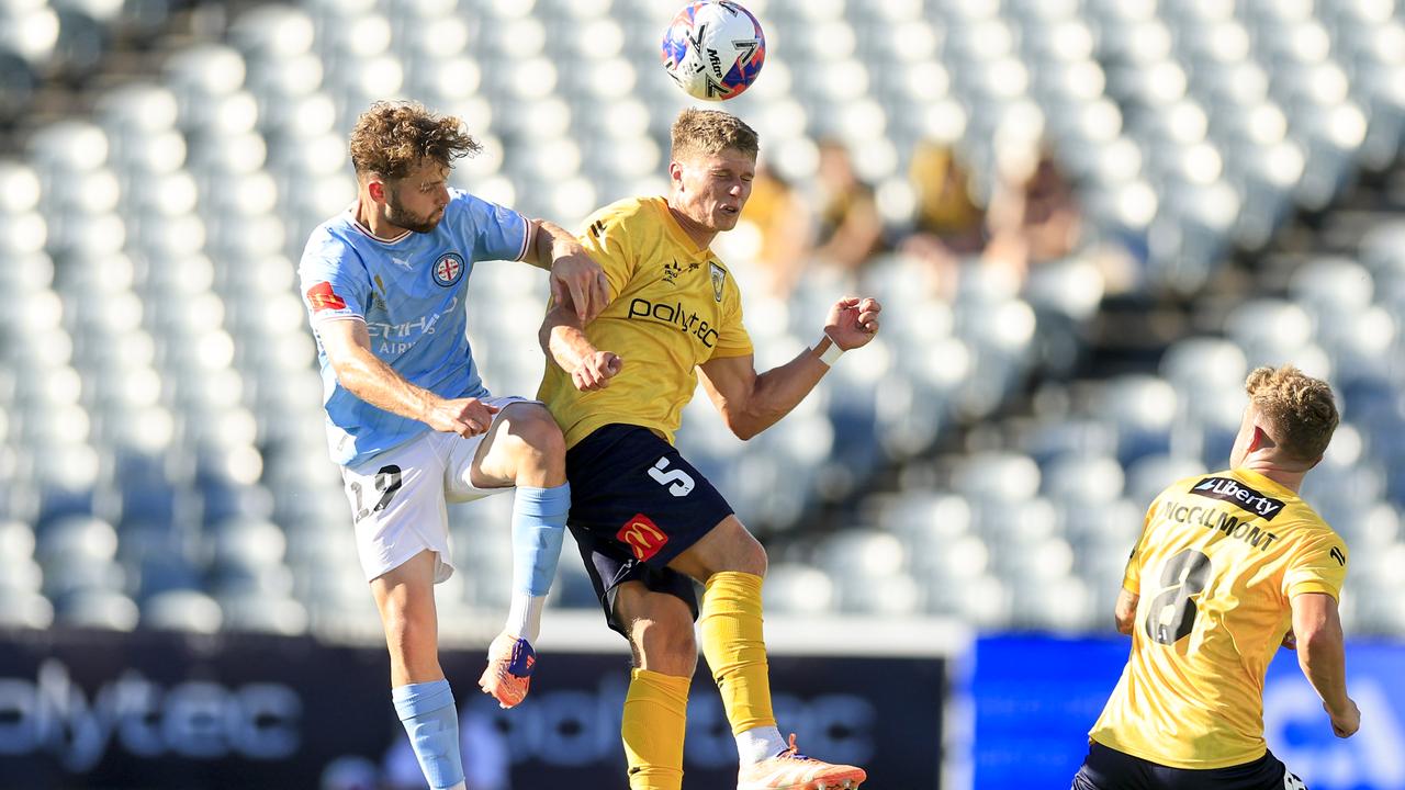 The Mariners' Lucas Mauragis heads the ball