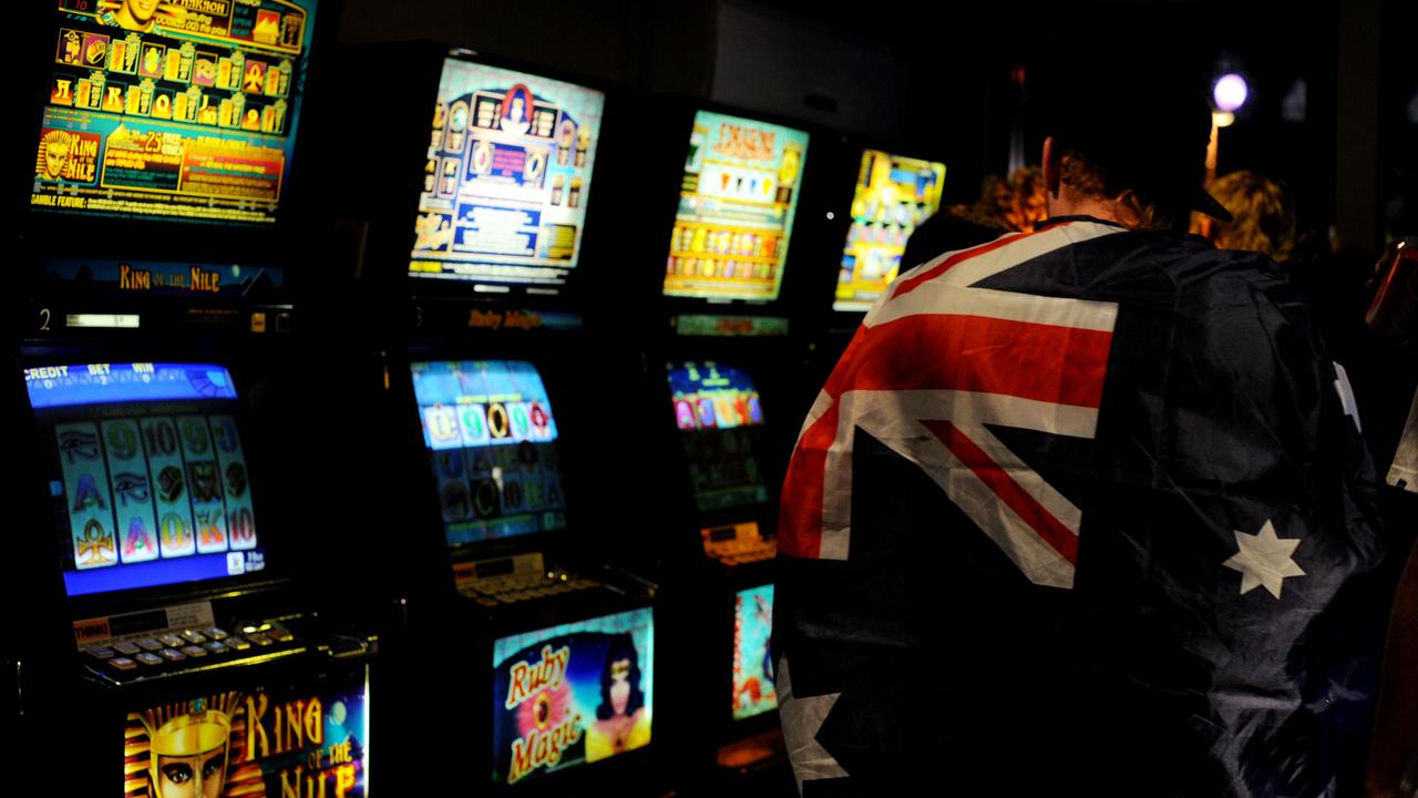 Festival goers use poker machines