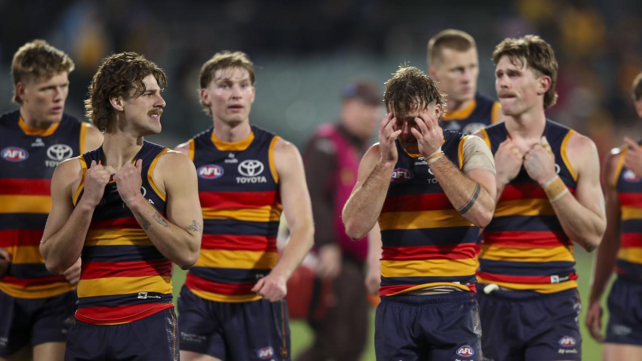 Disappointed Adelaide Crows players.