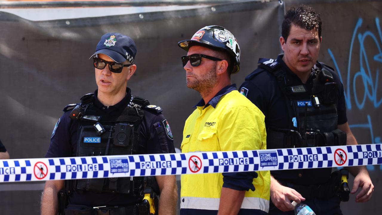 Police at the scene of a workplace incident at West End, Brisbane
