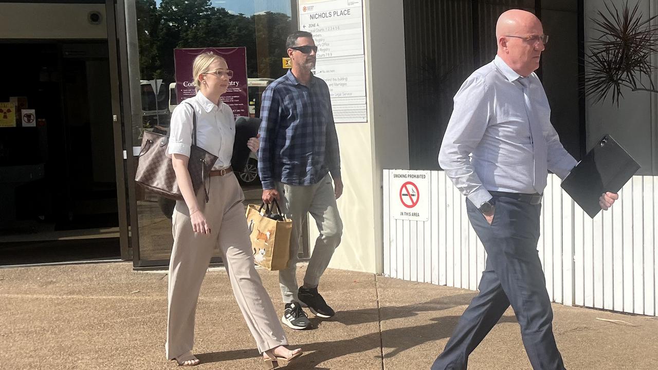 Peter Scammell (centre) leaves court