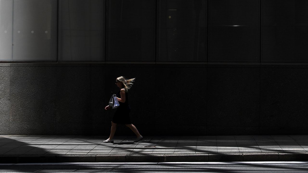 Office workers are seen in Sydney