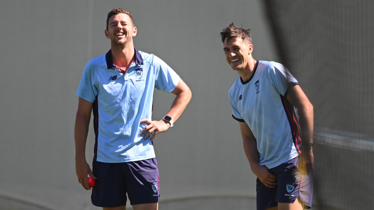 (L-R) Josh Hazlewood and Pat Cummins.