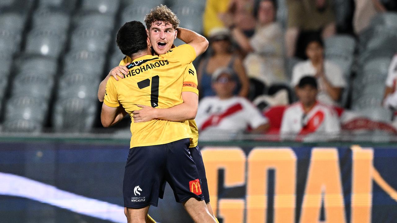 Bradley Tapp with Christian Theoharous.