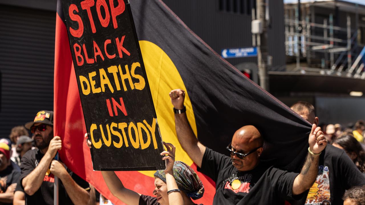 Protesters hold placards (file image)