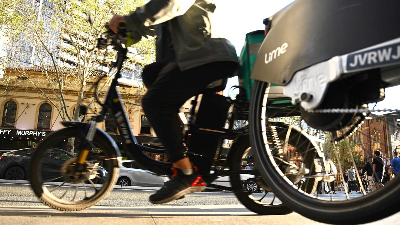 People are seen riding E-Bikes in Sydney,