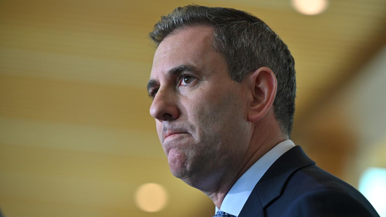 Treasurer Jim Chalmers speak to journalists in Canberra