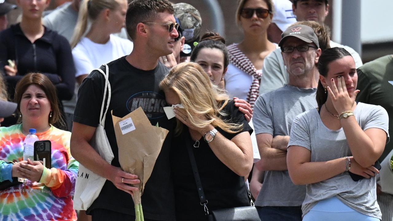 Morners at the scene of the shooting at Bondi Beach