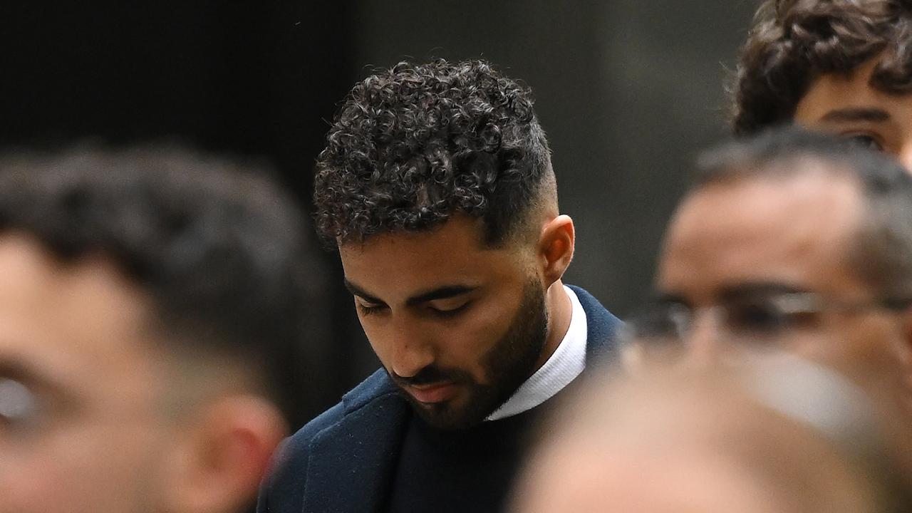 Kamal Ghali (centre, file)