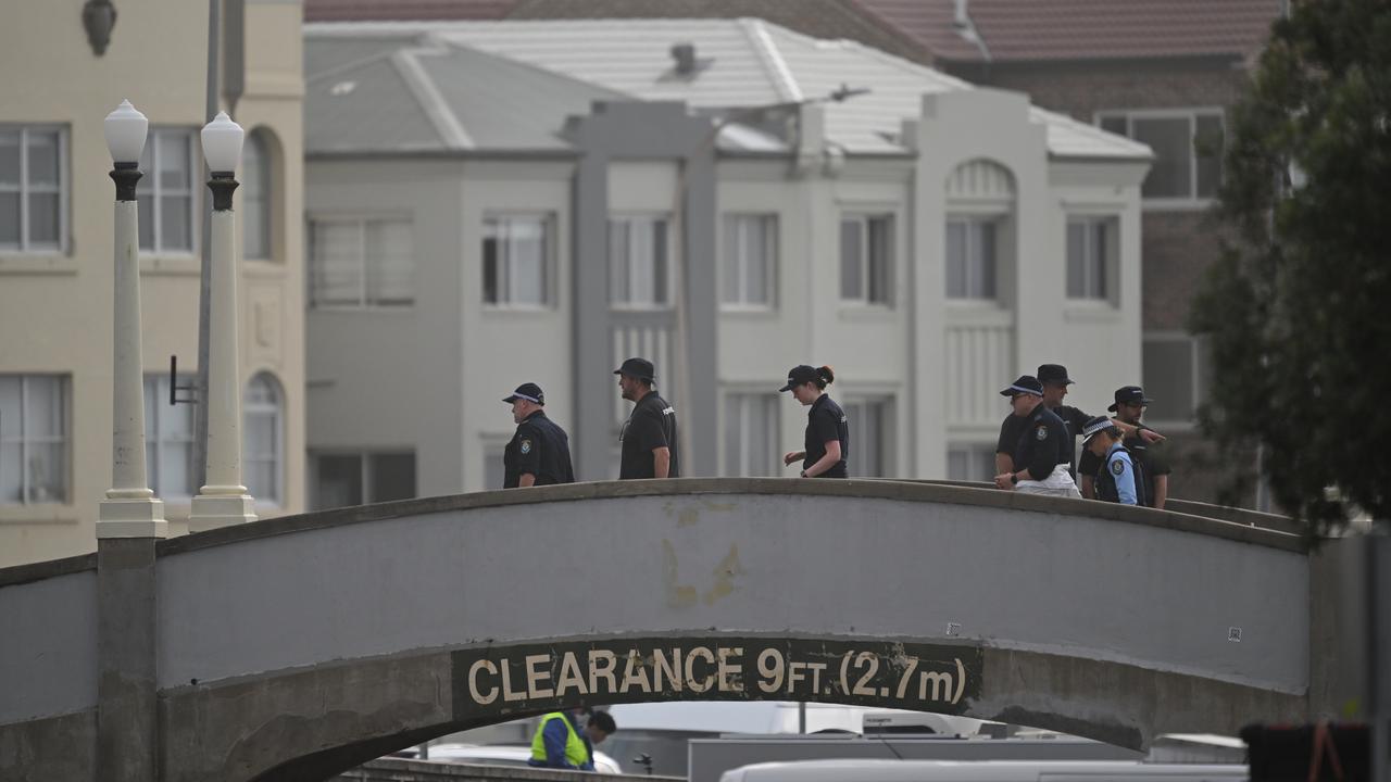 Forensic officers on the bridge at Bondi Beach (file image)