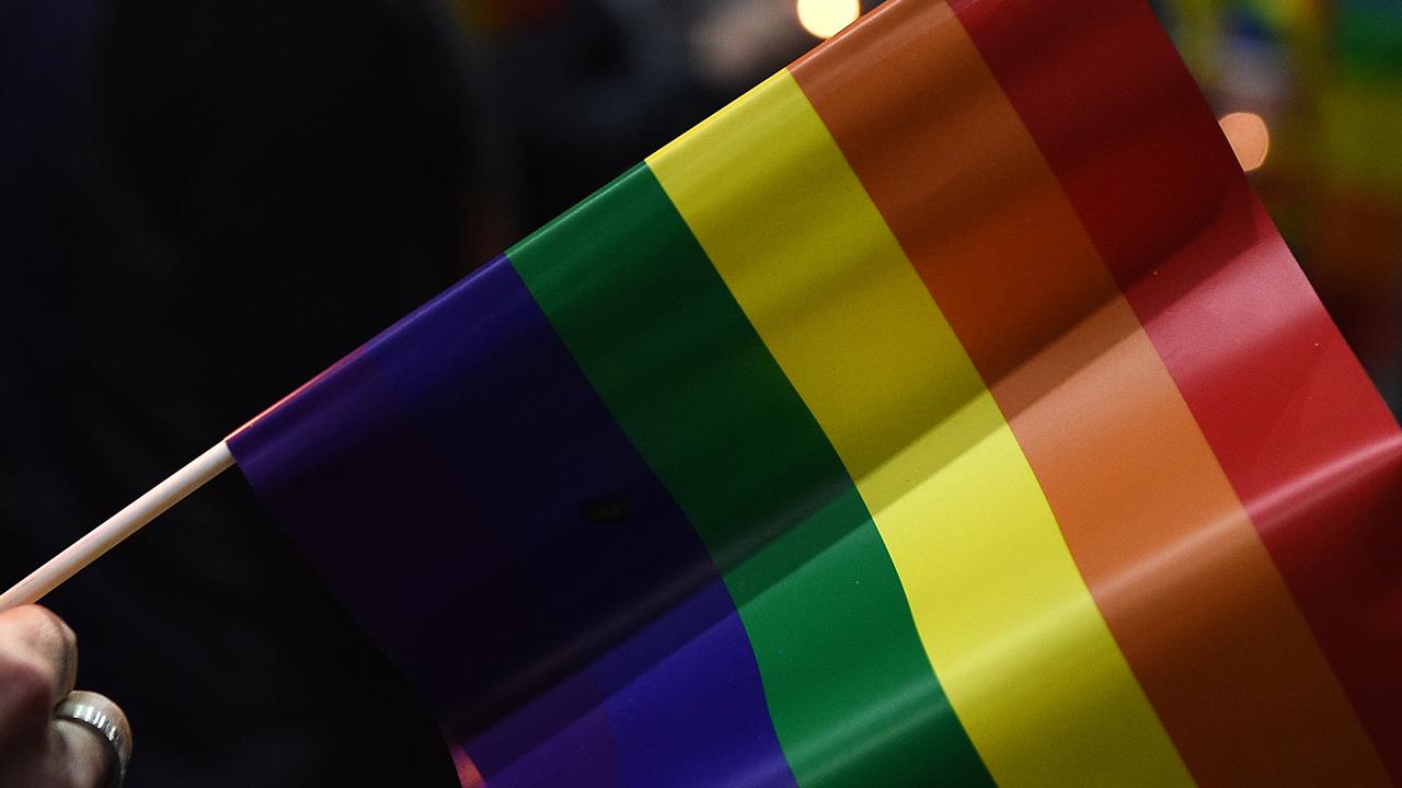 People gather at a vigil