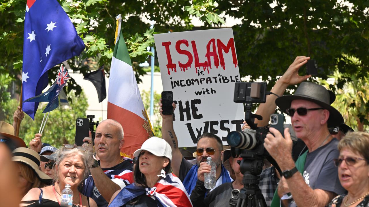 Protesters with flags and placards