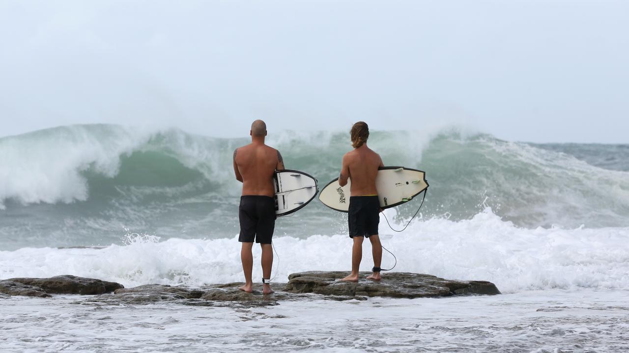 Surfers at Point Cartwright