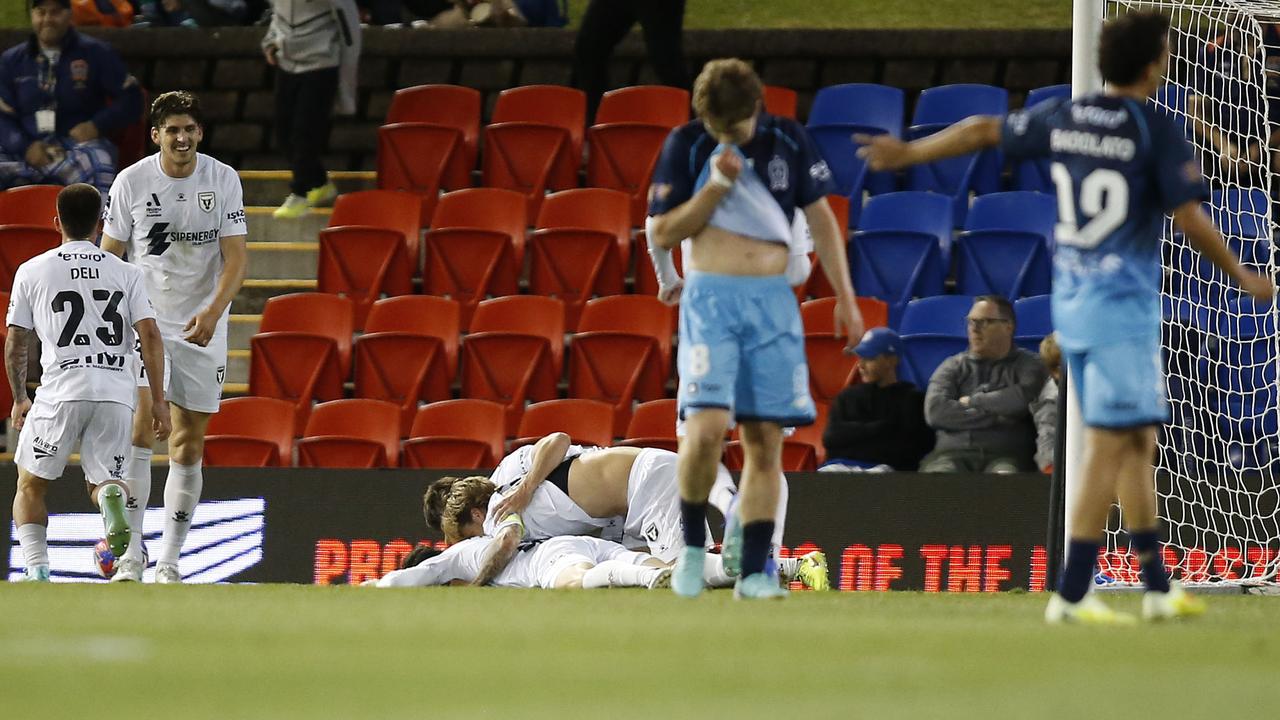 Dejected Newcastle players