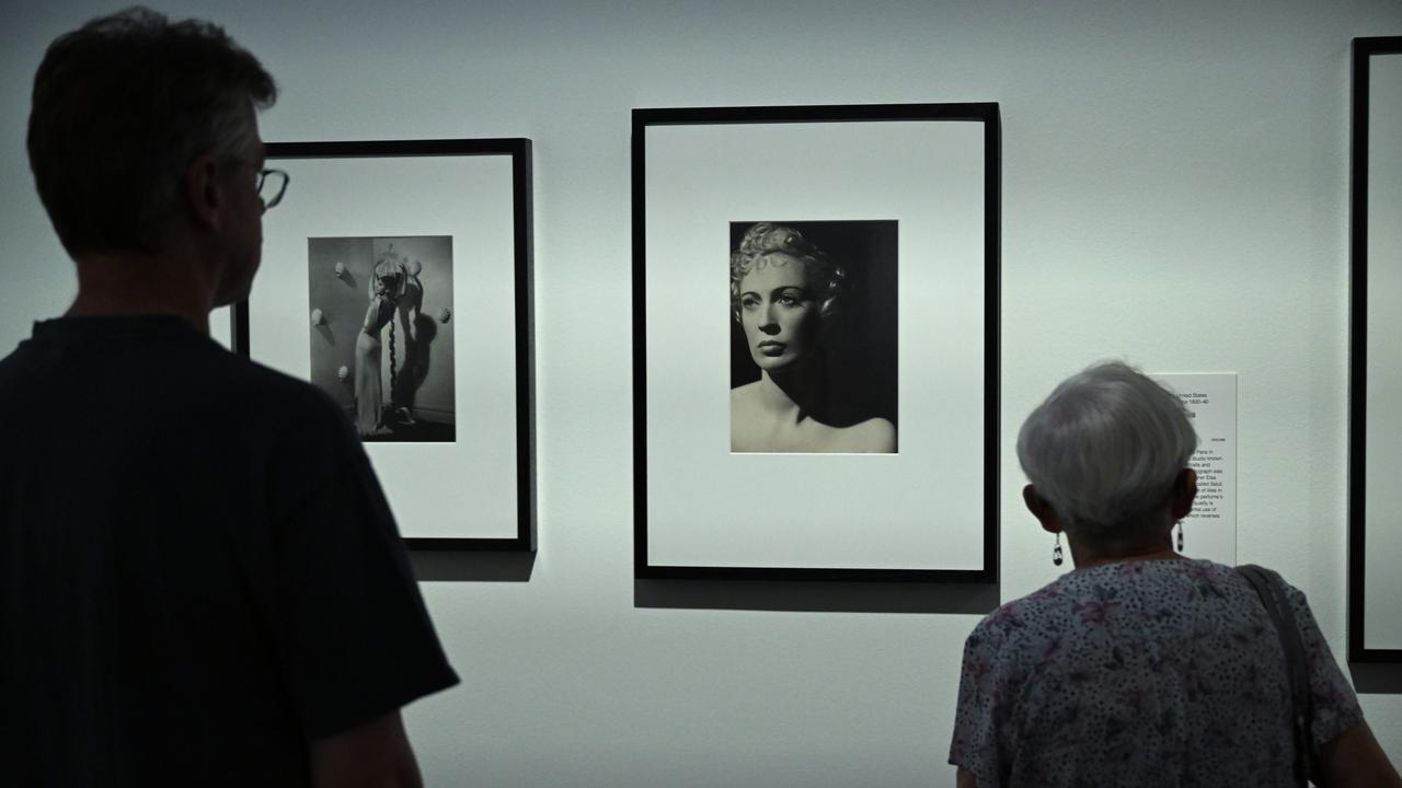 Visitors view a Dora Maar photo