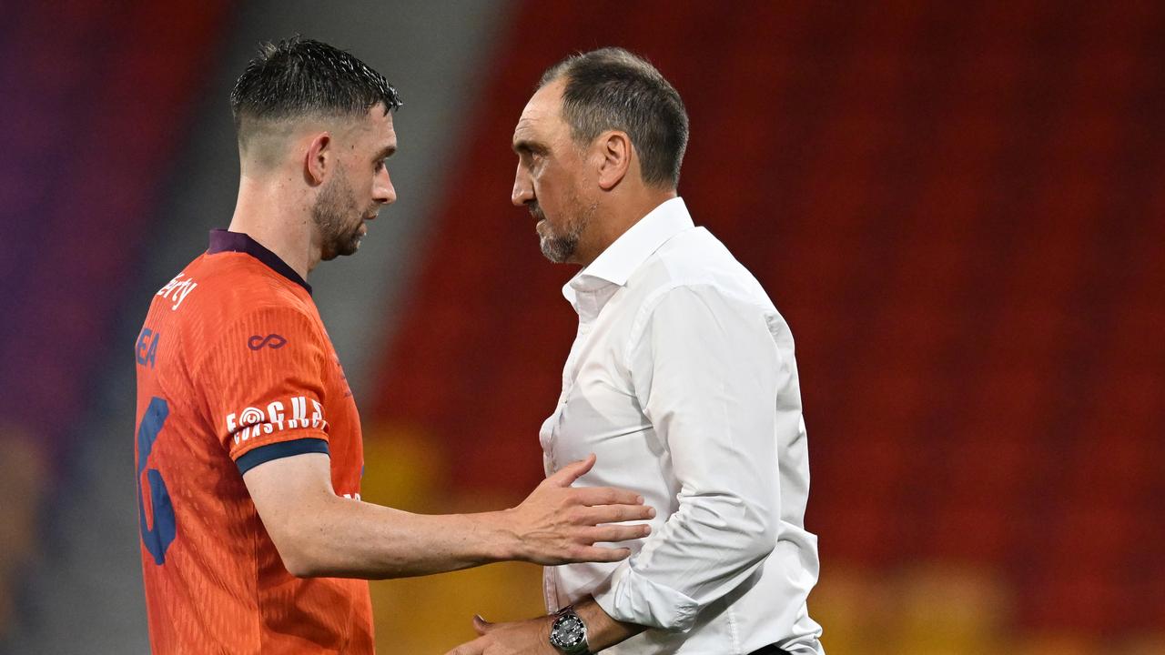 Brisbane's Jay O'Shea and Roar coach Michael Valkanis