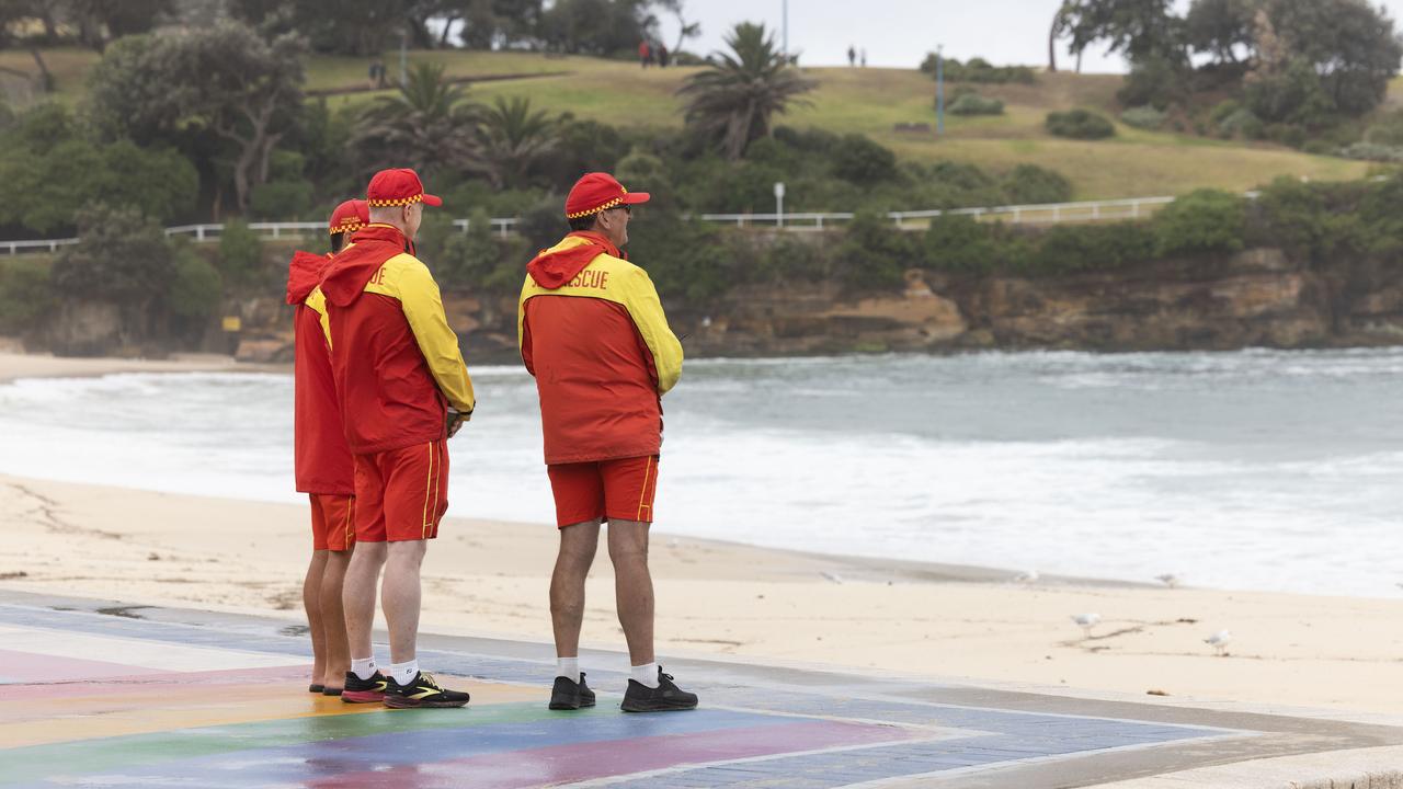Surf Lifesavers look out to sea during a search at Coogee Beach
