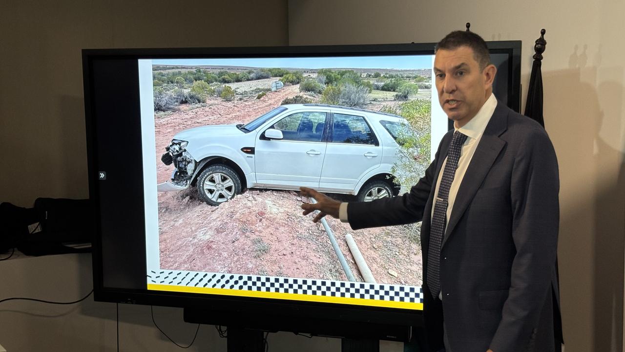Superintendent Darren Fielke with a picture of Trisha Graf's vehicle