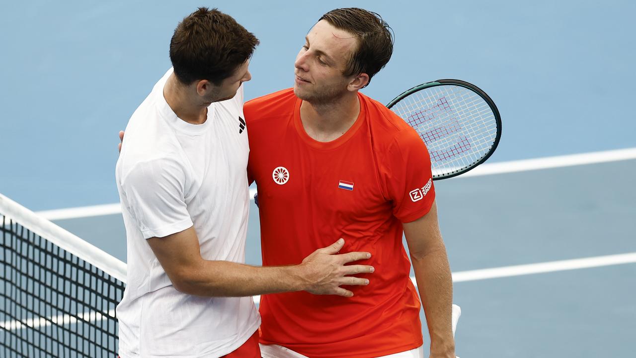 Hubert Hurkacz and Dutchman Tallon Griekspoor embrace