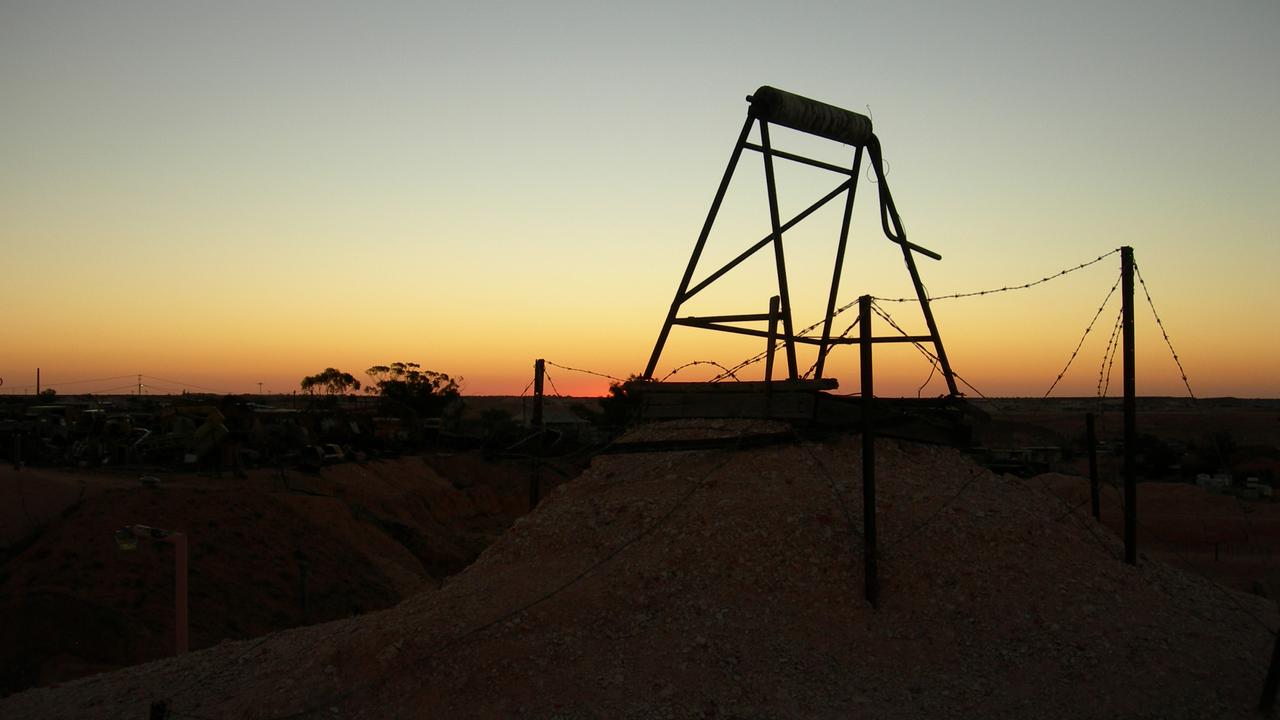 Sunset over a mine shaft outside the Desert Cave Hotel, Coober Pedy