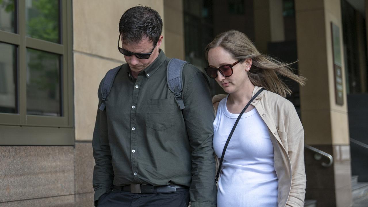 Carl Jones and his wife leave the Melbourne Magistrates Court
