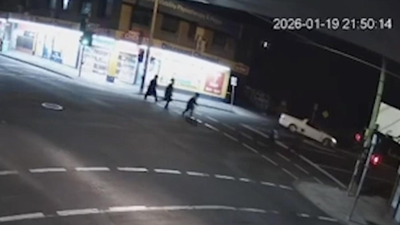 CCTV shows the ute stop near a group of Jewish teenagers