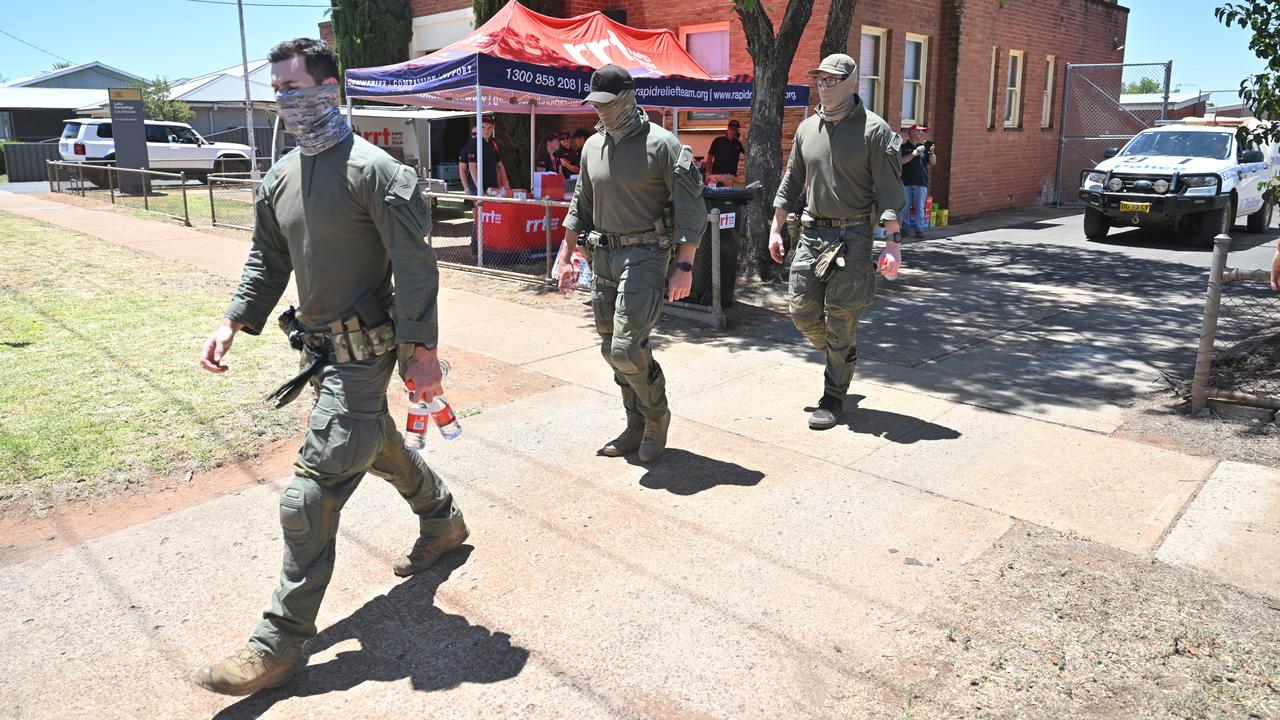 NSW police specialists outside the police station in Lake Cargelligo,