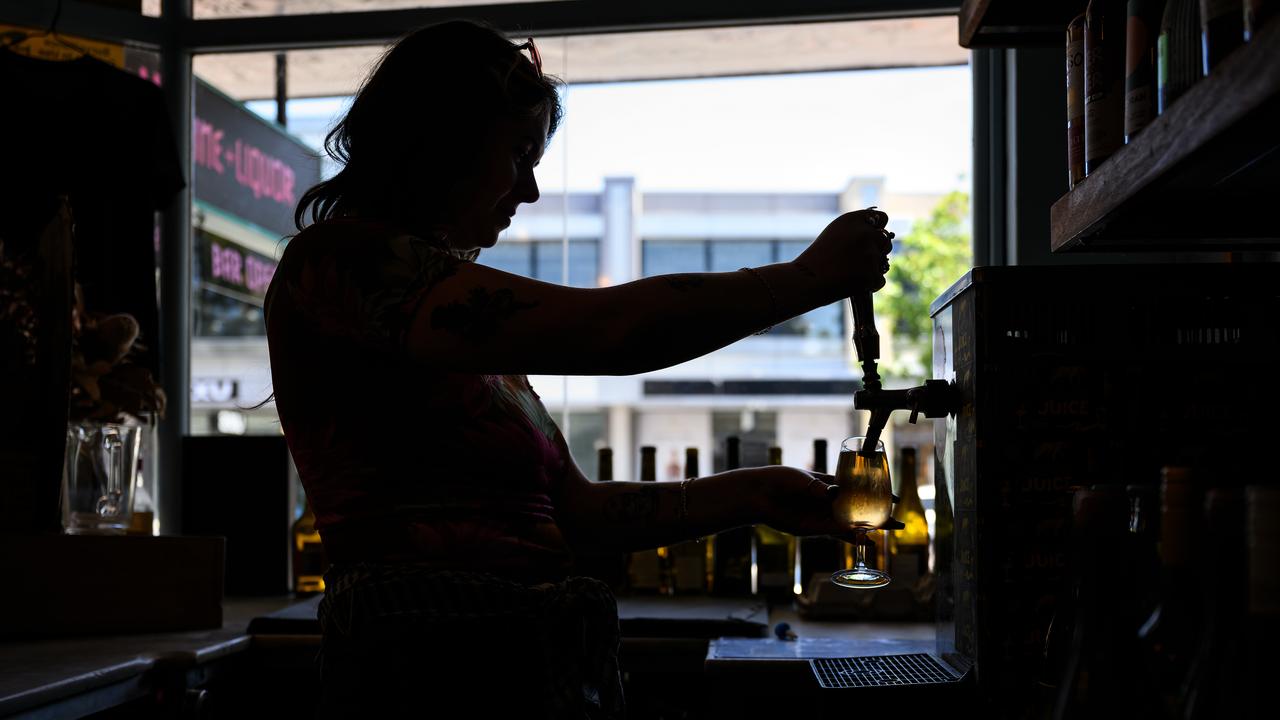 Pub working pulling a beer