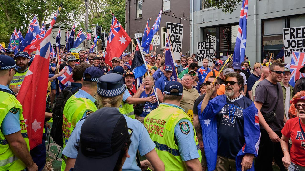 People attend an anti-immigration March for Australia rally in Sydney