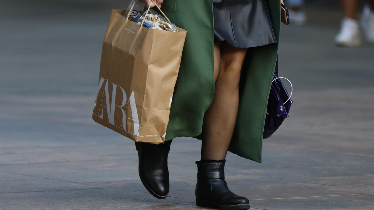 A person holds shopping bags (file image)