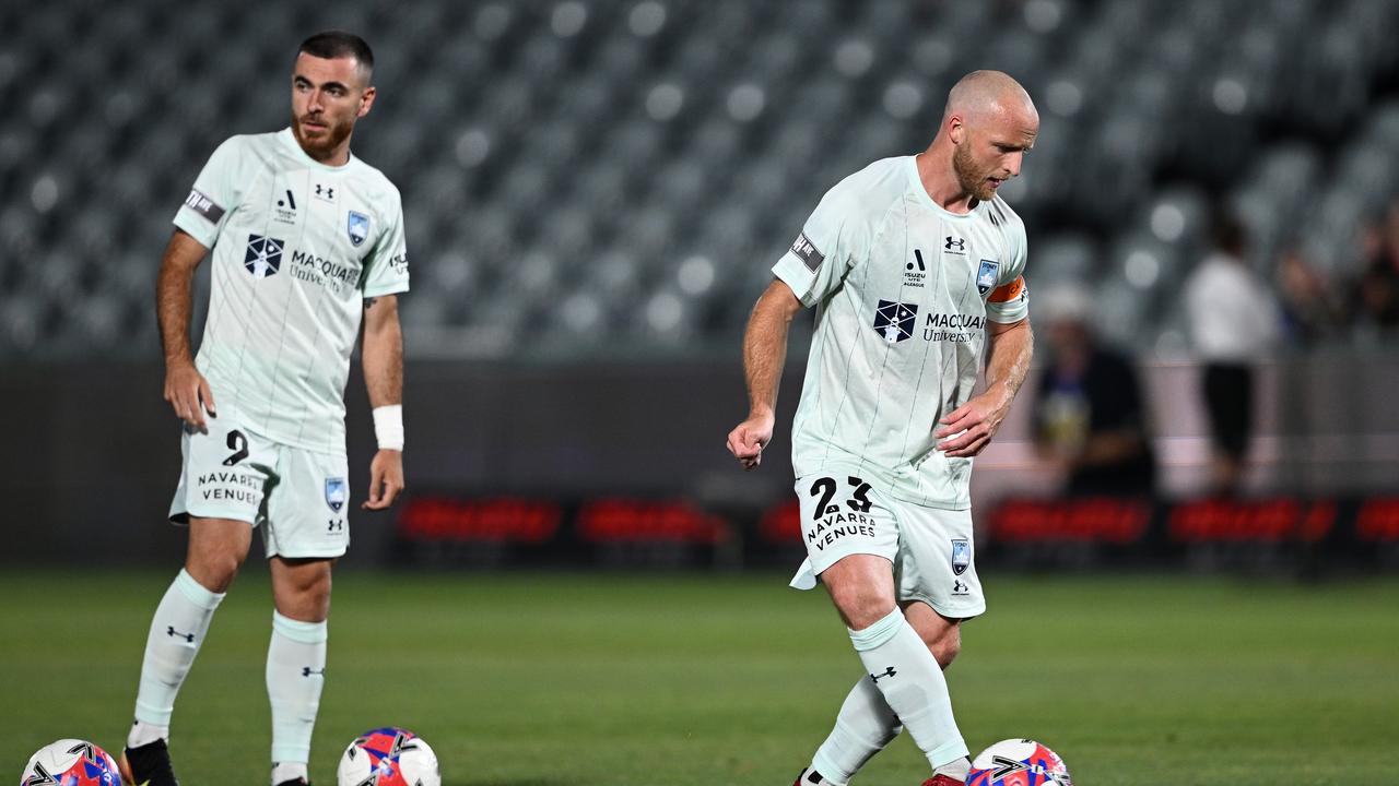 Sydney captain Rhyan Grant (right)