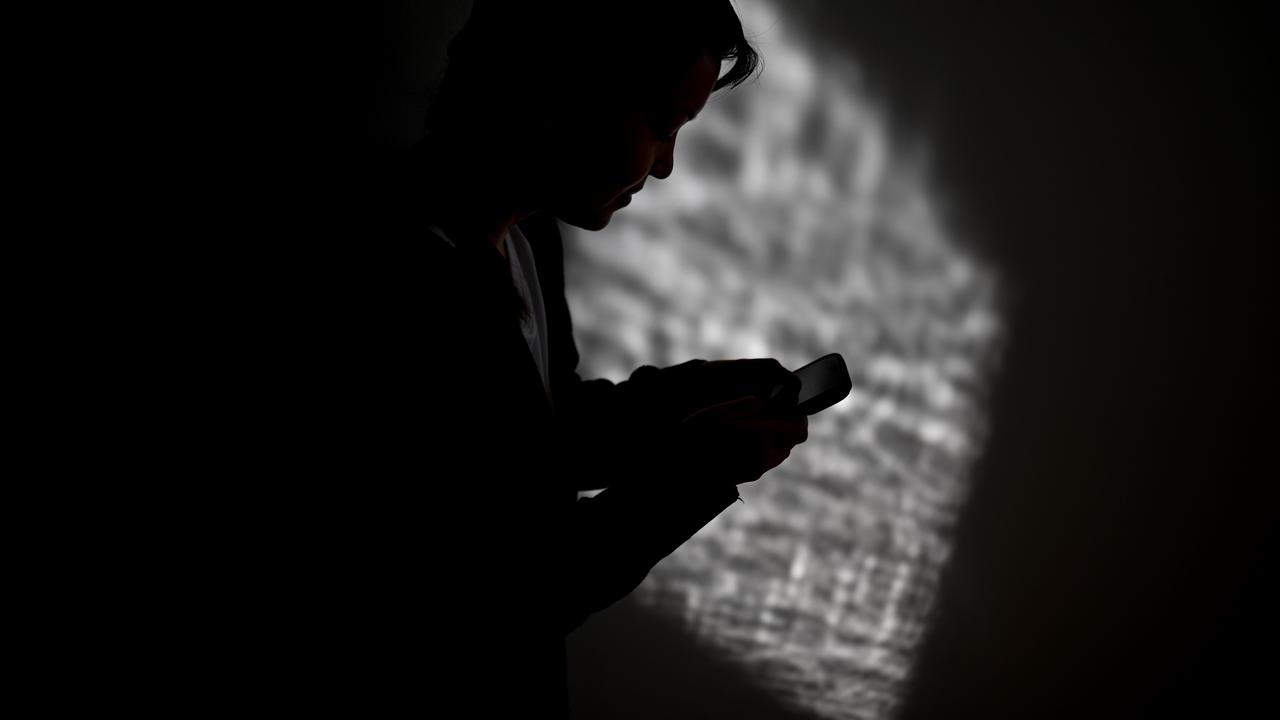 A woman on her mobile phone (file image)