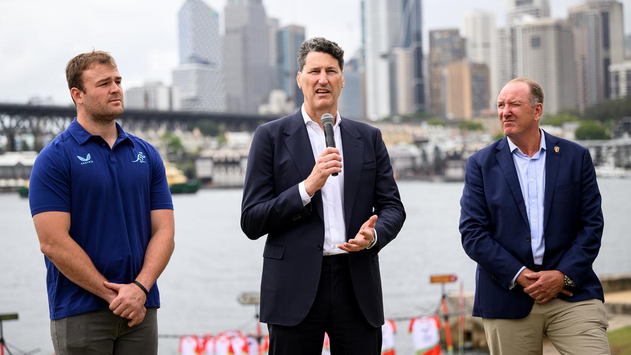 Harry Wilson, John Eales and World Rugby chair Brett Robinson.