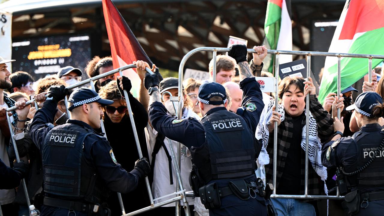 Protesters and NSW Police clash during an attempted blockade