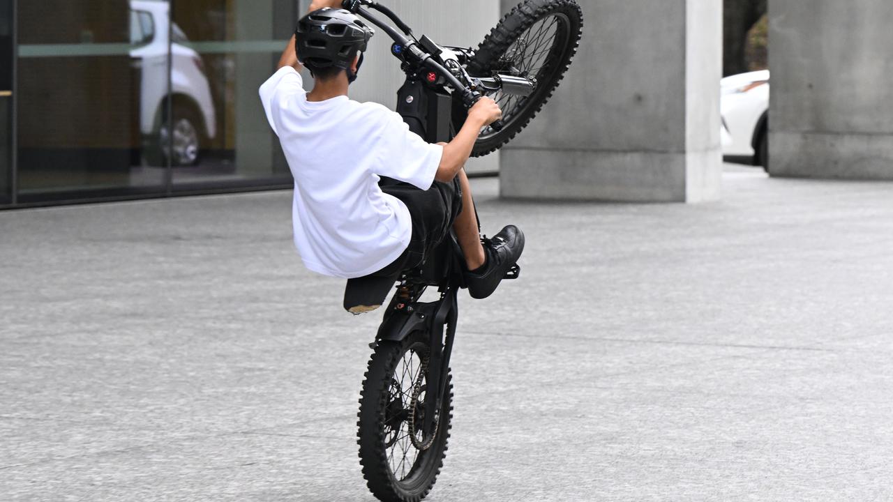 An e-bike rider doing a wheelie (file image)