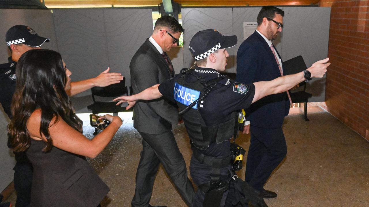 Nathan McKeown escorted by police