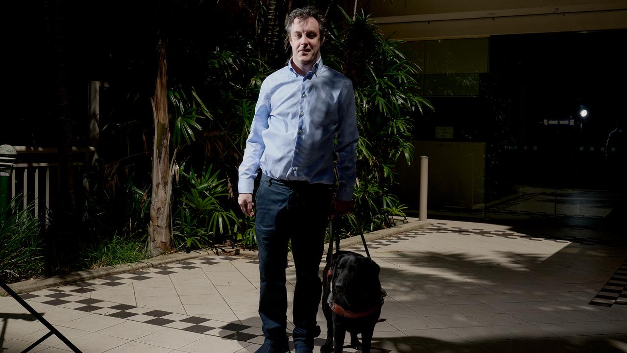 Sydney lawyer Scott Erichsen, who is blind and uses a guide dog