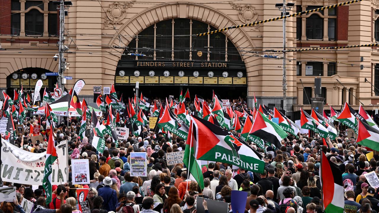 Protesters at Flinders Street Station in Melbourne