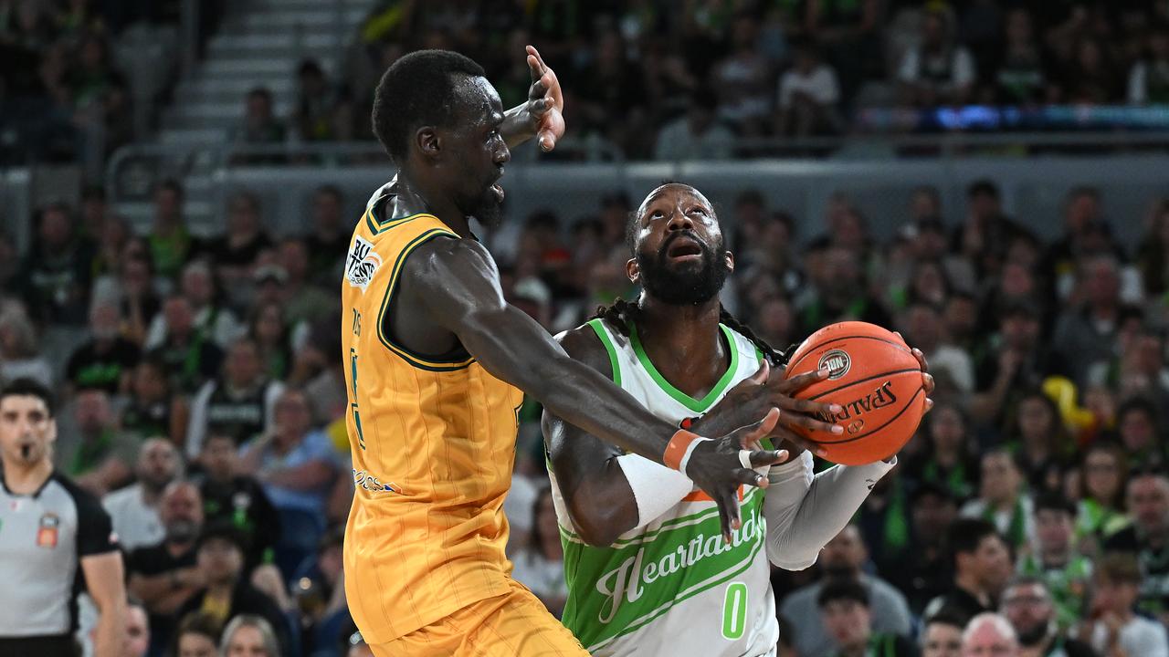 John Brown had a tall order trying to get over  Majok Deng.