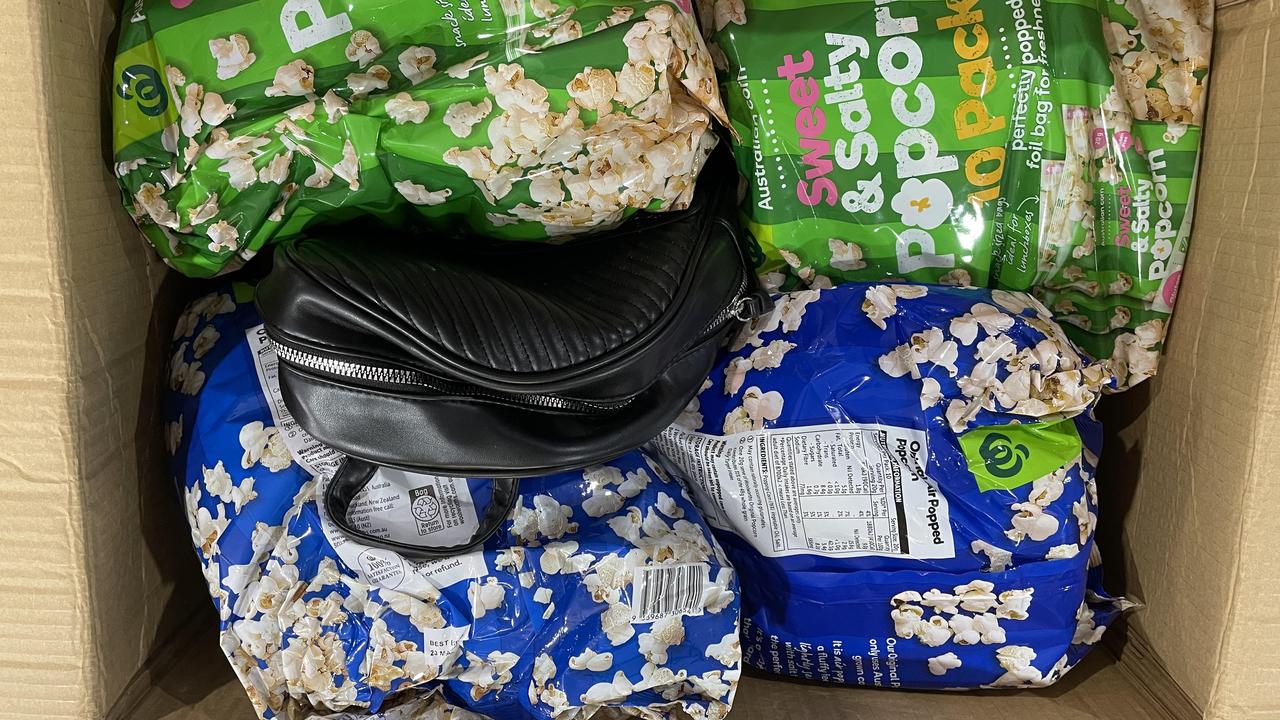 popcorn packets, biscuit tins and a handbag.