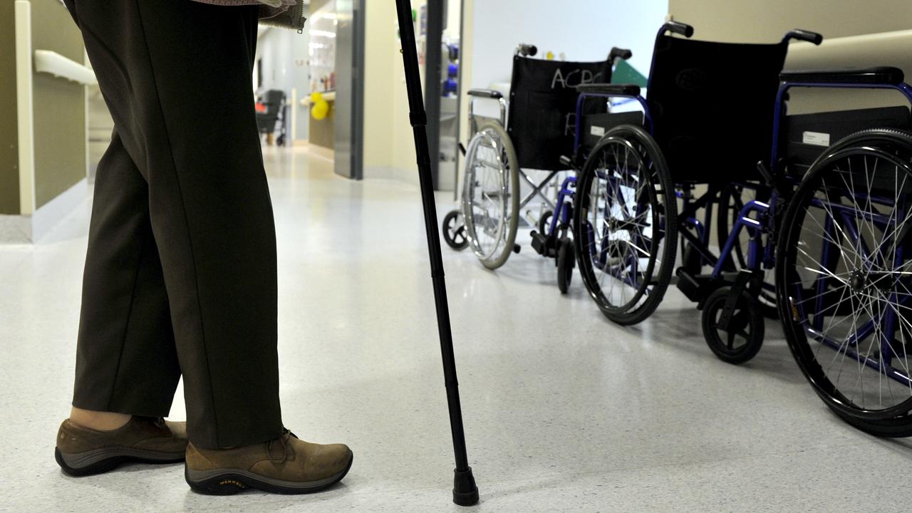 A woman uses a walking stick (file image)