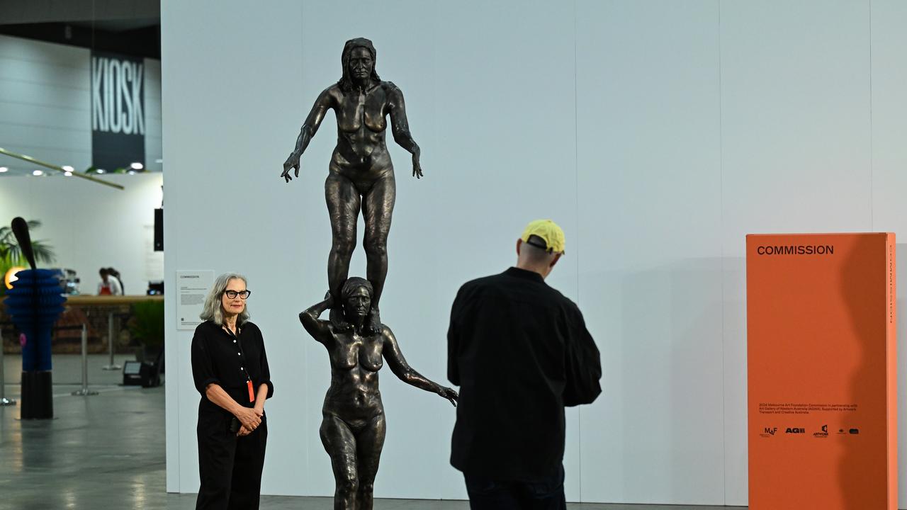 Australian artist Julie Rrap with her life-size sculpture (file image)