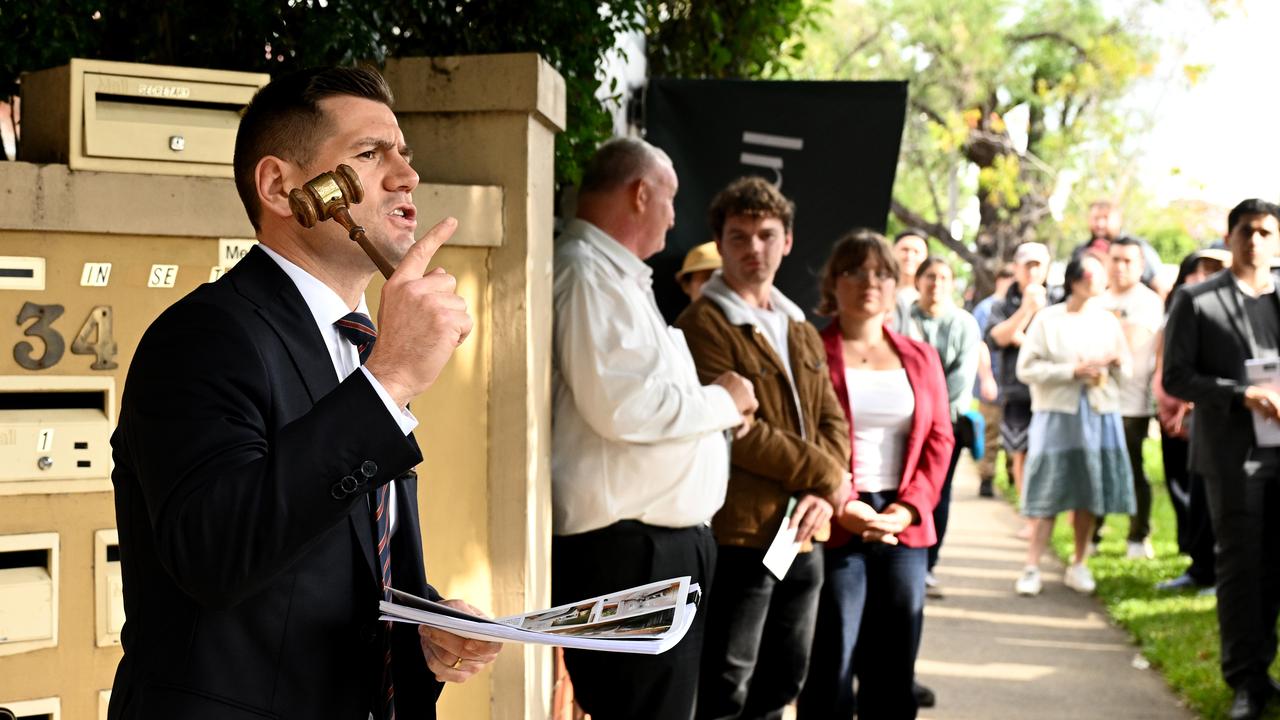 Auctioneer presides over a property auction at Homebush, Sydney