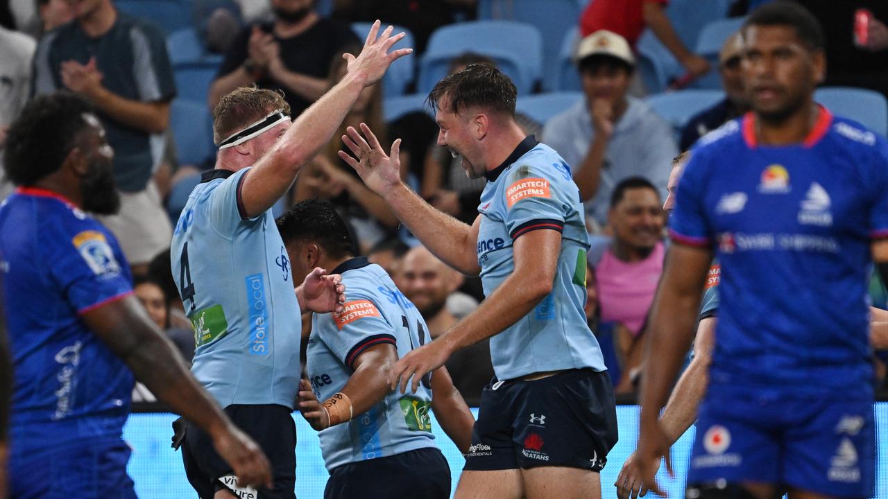 Celebrating NSW Waratahs players.