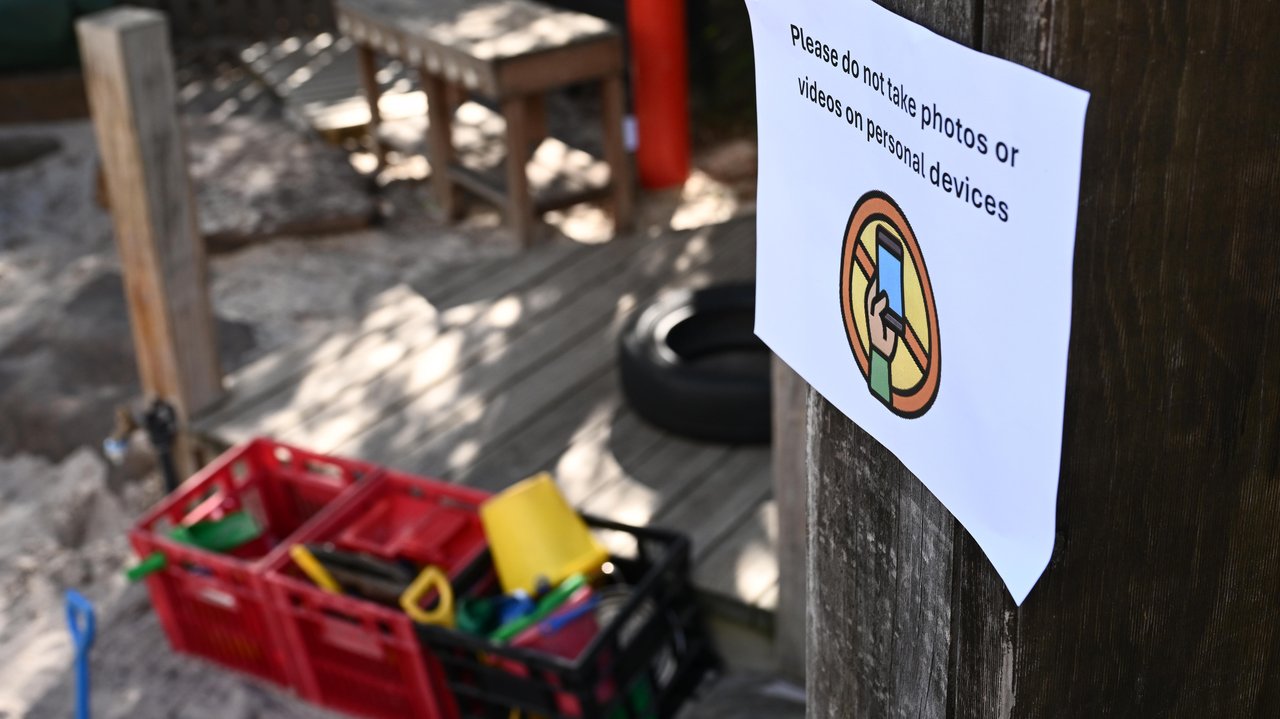 Signage prohibiting the use of devices to take photos at a centre